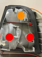 Load image into Gallery viewer, OUTER TAIL LIGHT LAMP 320i 323i 323ic 323is 325ci 325i 328i 99-01 Left - NW180342