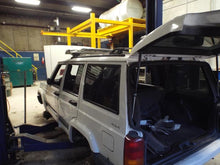 Load image into Gallery viewer, Headlight Lamp Assembly Jeep Cherokee 2000 - MRK467625