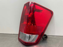 Load image into Gallery viewer, OUTER TAIL LIGHT LAMP Titan 05 06 07 08 09 10 11 12 13 14 Right - NW391559