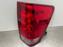 Load image into Gallery viewer, OUTER TAIL LIGHT LAMP Titan 05 06 07 08 09 10 11 12 13 14 Right - NW391559