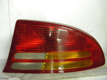 Load image into Gallery viewer, OUTER TAIL LIGHT LAMP Dodge Intrepid 98 99 00 01 02 03 04 Right - MRK67590