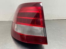 Load image into Gallery viewer, [INVENTORYCAR_YEAR_MAKE_MODEL] OUTER TAIL LIGHT LAMP Left - NW632570
