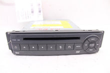 Load image into Gallery viewer, DVD PLAYER Routan 2009 09 2010 10 2011 11 2012 12 2013 13 2014 14 - 1016441
