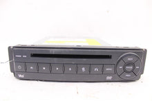 Load image into Gallery viewer, DVD PLAYER Routan 2009 09 2010 10 2011 11 2012 12 2013 13 2014 14 - 1017829
